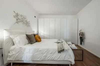 Letto o letti in una camera di RESIDENZA BELLA VITA, eleganza in centro