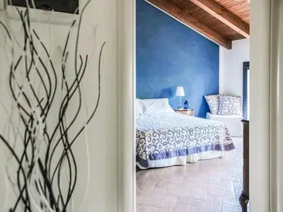 Letto o letti in una camera di Quattrocolli B&B