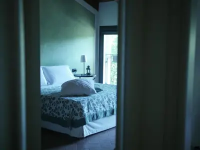 Letto o letti in una camera di Quattrocolli B&B