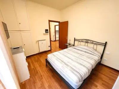 Letto o letti in una camera di Appartamento Noris