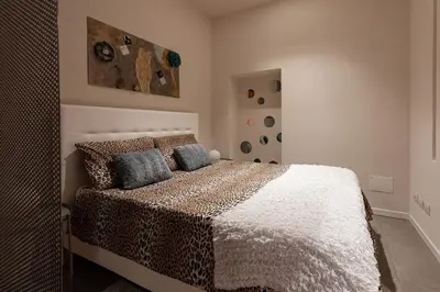 Letto o letti in una camera di BORGO DEGLI STUDI 7