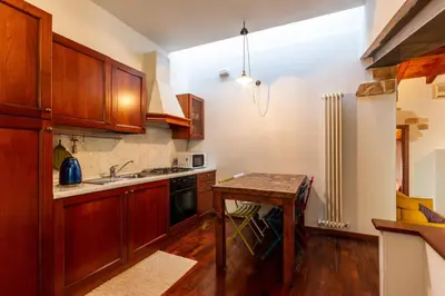 Cucina o angolo cottura di La Terrazza Apartment - Smart Holiday
