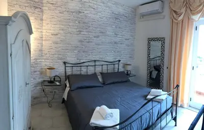 Letto o letti in una camera di Casa Vacanza La Luna