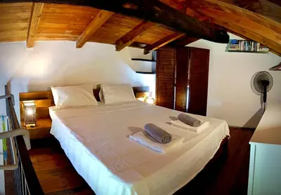 Letto o letti in una camera di Casa Volpe