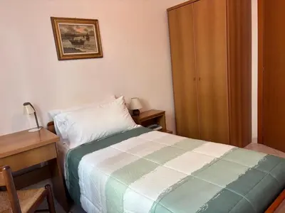 Letto o letti in una camera di Albergo Edera