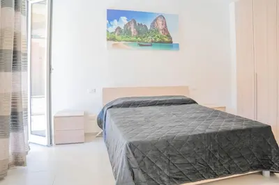 Letto o letti in una camera di 045b - Villetta Moderna 02-24E con VASCA IDROMASSAGGIO in giardino, solo 15 minuti da Mare e Spiaggia - Posto Auto GRATUITO