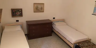 Letto o letti in una camera di Casa Romeo