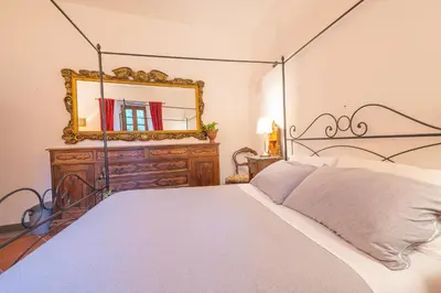 Letto o letti in una camera di Veleia Romana B&B