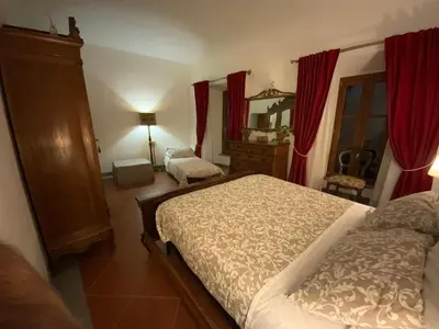 Letto o letti in una camera di Veleia Romana B&B