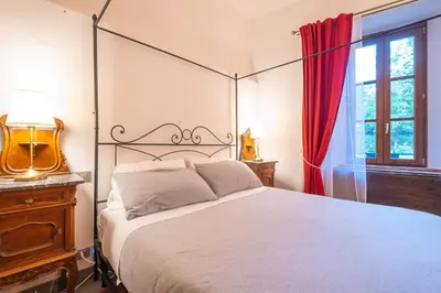 Letto o letti in una camera di Veleia Romana B&B