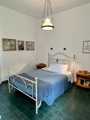 Letto o letti in una camera di Villa con vista Sestri Levante