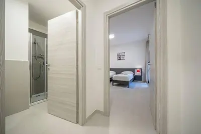 Letto o letti in una camera di [RUA MURO] Piano Nobile Family