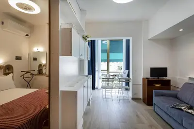 TV o dispositivi per l'intrattenimento presso Mondial Apartment by Wonderful Italy