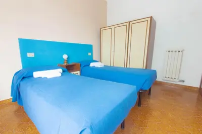 Letto o letti in una camera di Casa Vinicia