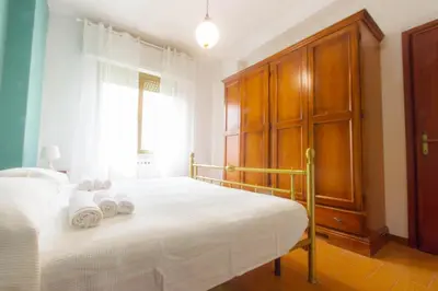 Letto o letti in una camera di Casa Vinicia