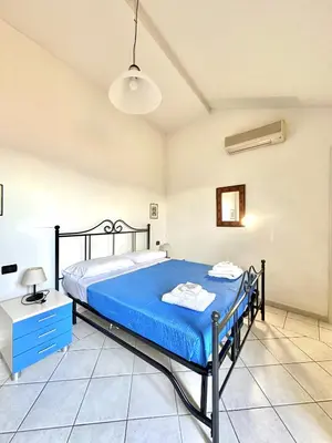 Letto o letti in una camera di La Spezia Vezzano 5 terre - Il Ciliegio