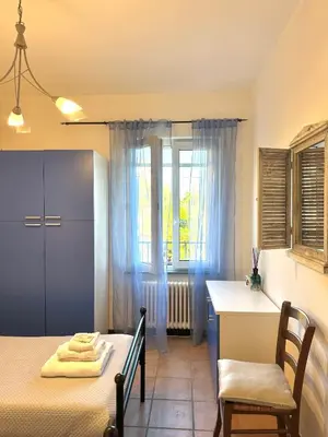 Letto o letti in una camera di La Spezia Vezzano 5 terre - Il Ciliegio