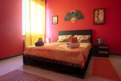 Letto o letti in una camera di KOMOREBI Cinque Terre & Lunigiana