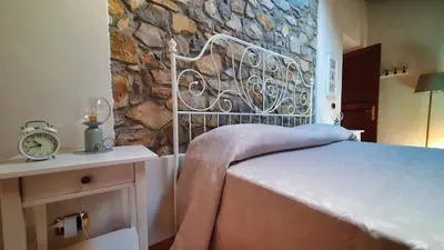 Letto o letti in una camera di Il Bordone del Pellegrino