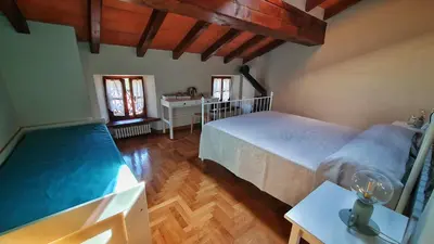 Letto o letti in una camera di Il Bordone del Pellegrino