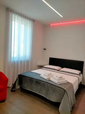Letto o letti in una camera di Casa Antelami