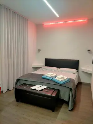 Letto o letti in una camera di Casa Antelami