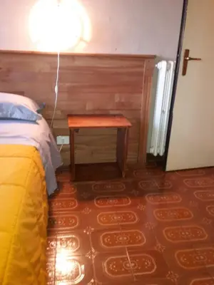 Letto o letti in una camera di Agriturismo Dosso al Porto