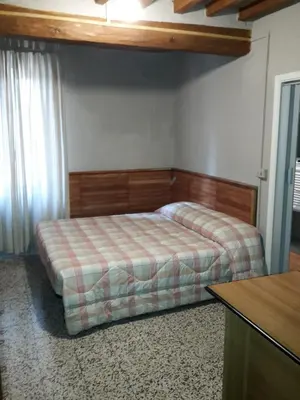 Letto o letti in una camera di Agriturismo Dosso al Porto
