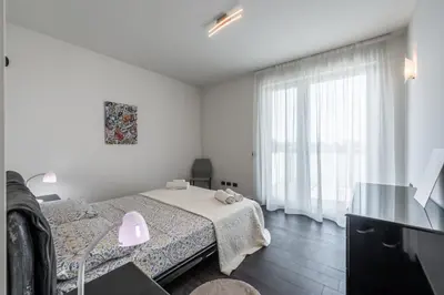 Letto o letti in una camera di Ospedale Baggiovara - Guerrilla Art House
