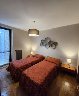 Letto o letti in una camera di Hotel Mistrello di Savoia
