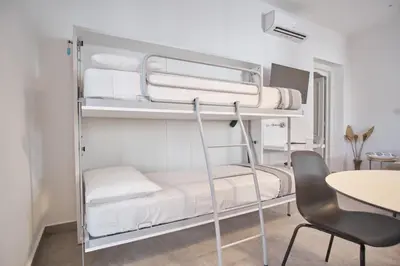 Letto o letti in una camera di Casa Maluna