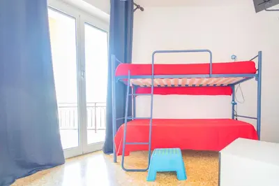 Letto o letti in una camera di 193 - Casa Via della Chiusa - centralissimo e vicino alla baia del silenzio, spiaggia e mare 150m - Parcheggio GRATIS incluso e Aria condizionata