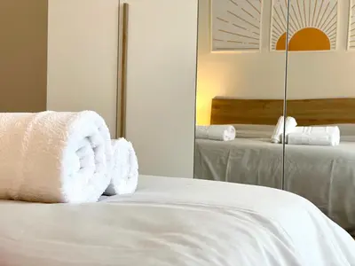 Letto o letti in una camera di SUITE Celeste - 2 Bagni e 2 Camere da Letto