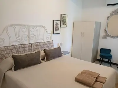 Letto o letti in una camera di Le Drupe