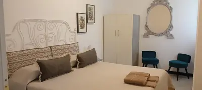 Letto o letti in una camera di Le Drupe
