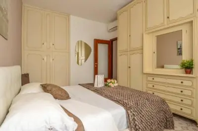 Letto o letti in una camera di Sea La Vie