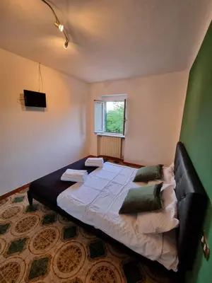 Letto o letti in una camera di Ca' della Bardona