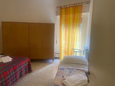Letto o letti in una camera di Casa Marchelli