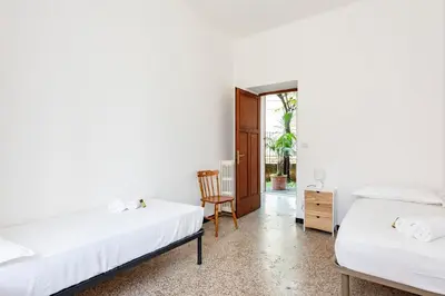 Letto o letti in una camera di JOIVY Sunny flat near the beach