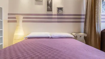 Letto o letti in una camera di MonoliVi 35 - Affitti Brevi Italia