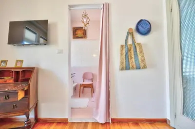 TV o dispositivi per l'intrattenimento presso Ca' Muna - Sea View Penthouse, Private Rooftop, Walking to the Beach