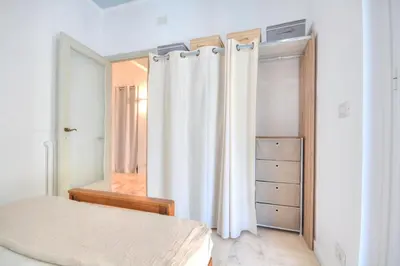 Letto o letti in una camera di Ca' Muna - Sea View Penthouse, Private Rooftop, Walking to the Beach