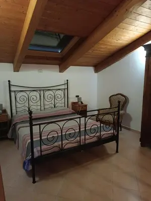 Letto o letti in una camera di La Casa sull'argine 2