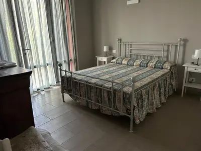 Letto o letti in una camera di Casetta rossa