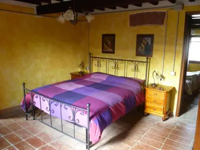 Letto o letti in una camera di Casolare Fratina