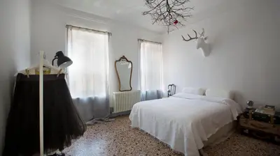 Letto o letti in una camera di Casa Tesor - your design home in Mantua city center