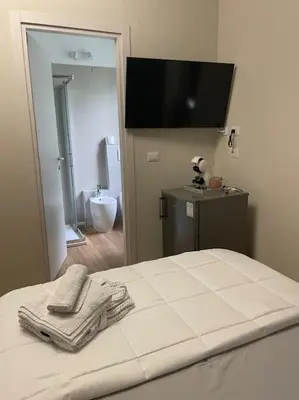 Letto o letti in una camera di Cucchiari Suite 8A