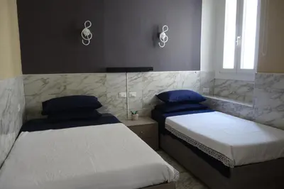 Letto o letti in una camera di AURY HOME -Self-Check-in-