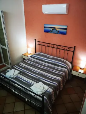Letto o letti in una camera di I Tre Abeti - Holiday House