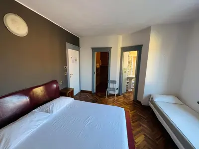 Letto o letti in una camera di B&B LE AMARENE
